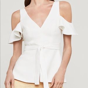 White peplum top